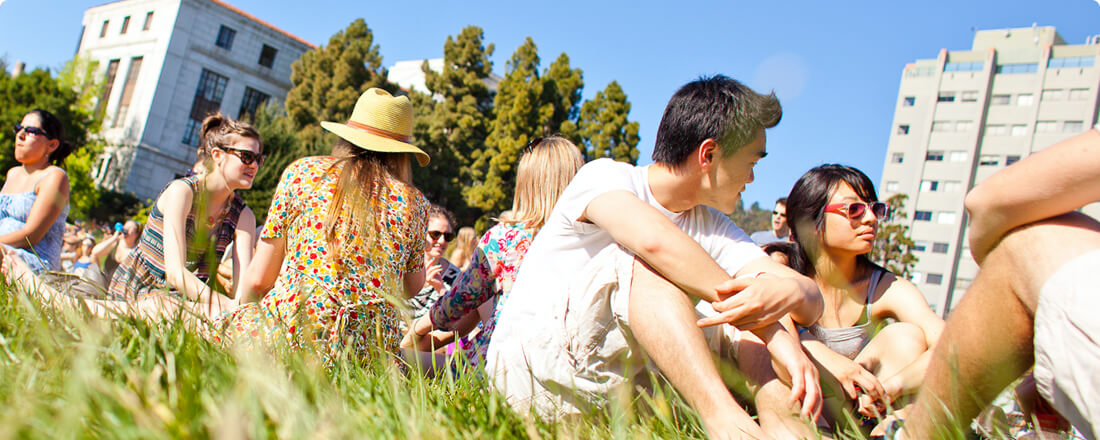 group sitting on the lawn